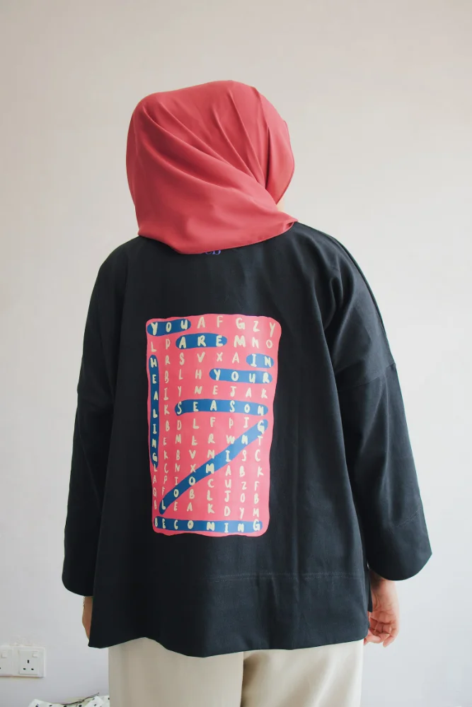 Woman In Her Season Tee in Black (Crossword)